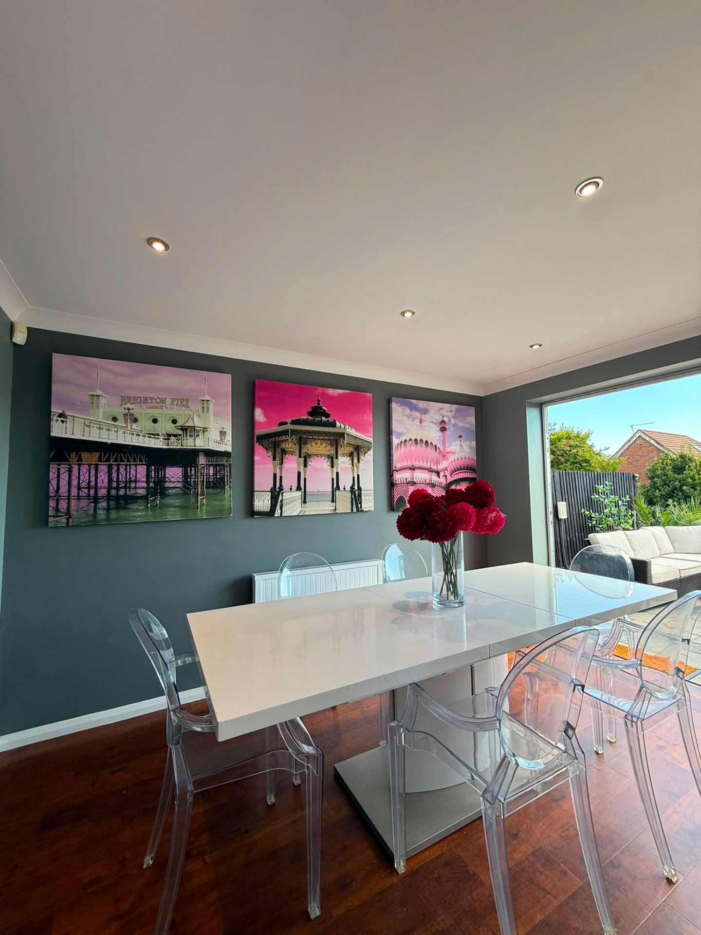 Dining space in dark grey opening onto garden bi-fold doors, Brighton